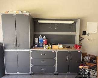 Coleman storage cabinets w/shop light