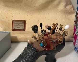 Vintage Victorian-style cast metal shoe pin cushion