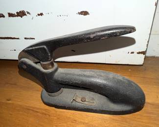 Cast iron hole punch