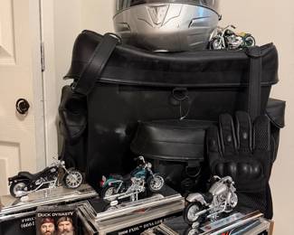 Harley Davidson motorcycle models with large saddlebag with many pockets and  motorcycle helmet. Duck Dynasty cards