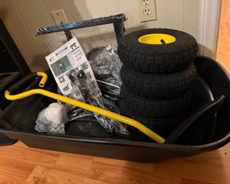 Brand New, unassembled 4-wheel wheelbarrow