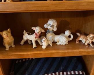 Porcelain dog and puppy figurines. 