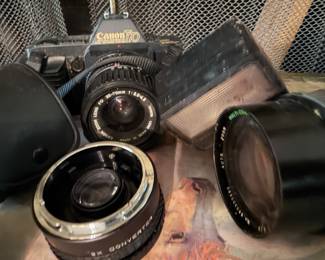 Vintage Canon T70 camera with 2x converter, flash kit, a macro 60-300 lens. Vintage leather bag for 2x converter 