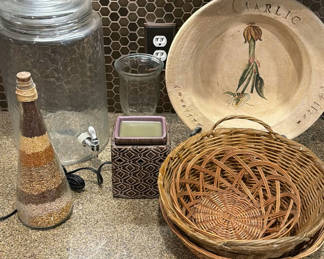 Lot 115: Glass dispenser, seed bottle, planter, baskets, plate, and jars
