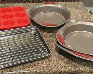 Lot 211: Rachael Ray bakeware set with round pans, muffin tray, and sheet pan with rack