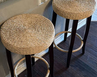 Lot 108: Two woven round-seat bar stools