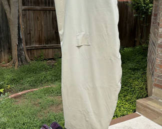 Lot 141: Patio umbrella with blue canopy and beige protective cover
