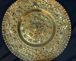 Lot 106: Decorative metal plate with Aztec calendar design