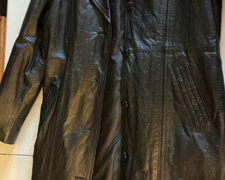 Lot 167: Long black leather coat