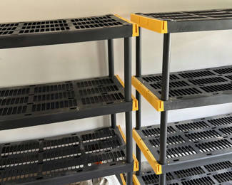 Lot 155: Black multi-tier shelving units with yellow corner brackets