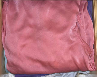 Lot 31: Assorted women's sleepwear and pastel fabrics