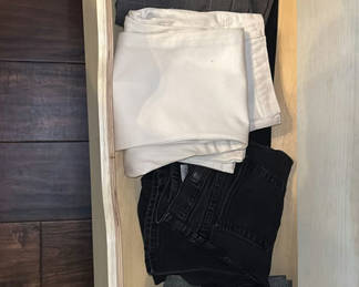 Lot 22: Assorted pants and jeans in a dresser drawer