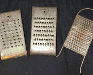 Lot 122: Vintage metal hand graters
