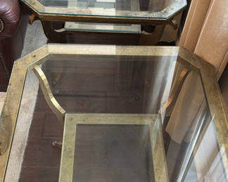 Lot 133: Pair of vintage brass-and-glass nesting tables