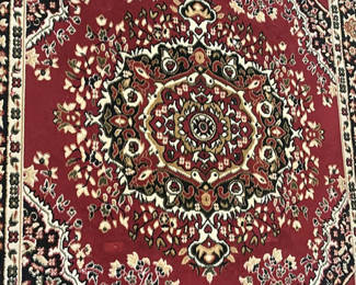 Lot 12: Red Patterned Area Rug
