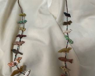 Vintage Zuni Fetish Necklace — single strand shell heishi with ~14-15 hand-carved animal fetishes (bears, birds, hummingbirds) in varied stone — serpentine, jasper, jet, turquoise, mother-of-pearl. 45.1g.