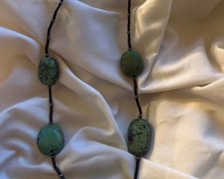 Vintage Turquoise Nugget Necklace — five large oval turquoise nugget stations with dark matrix, separated by dark tube-bead spacers and small silver rondelles, toggle clasp. Unmarked. 52.9g total.