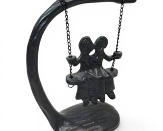 Cast Iron Man Woman on Swing