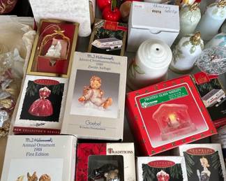 Assorted M.I. Hummel Figurines, Hallmark Keepsake Ornaments, and Collectibles