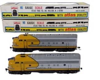 Two Atlas HO Gauge Yellow Santa Fe FP7 Diesel Units