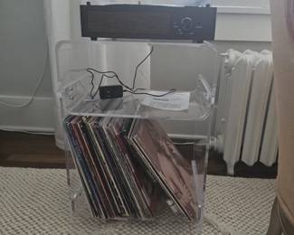 Vintage record player with various vinyl records