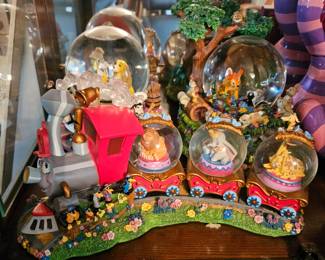 Disney Store exclusive Dumbo and Casey Jr. musical snow globe train & others