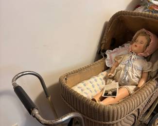 ANTIQUE DOLL AND WIICKER CARRIAGE