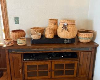TV console with inlaid slate and hand made baskets