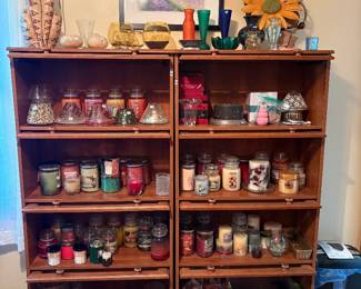 Yankee Candles in glass front lawyers book cases