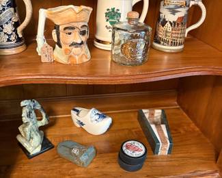 Toby mug, beer steins, marble pieces and signed hockey pucks
