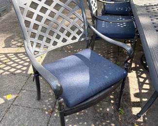 Another view of the cast aluminum patio armchairs (6 available)