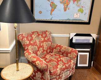 Ethan Allen armchair, table lamp, and large global map and larger-scale picture frames