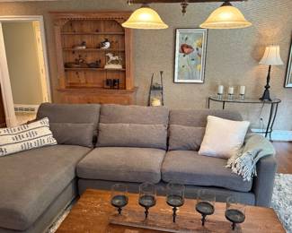 2-piece sectional with right-hand chaise, shown in front of pine cabinet with upper shelves with plate racks, demi-lune metal and glass table, lamps and more!