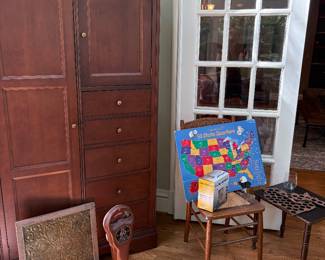Large storage armoire, parking meter, side chair and side table