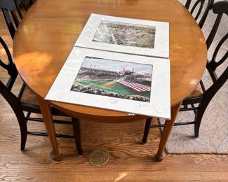 Oval dining table and pottery barn dining chairs (4),  Table has 2 additional leaves, shown with commemorative photographs numbered/signed