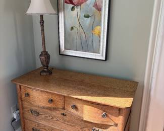 oak four drawer dresser, lamp and mixed media artwork