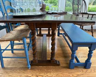 Trestle table - coverts to console table, shown with wood bench and 3 ladder -back chairs with rush seats