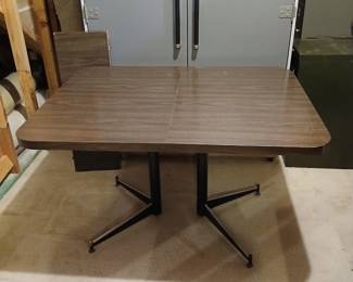 Fantastic work table with 12 inch leaf extension. Great for hobby room or workshop! Only 80.00!