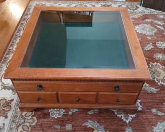Amazing "display" coffee table. Allows you to put things in it to create any display you want. You can change it for every season! Only 150.00!
