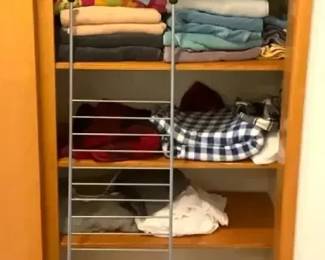Assorted linens and a towel tower
