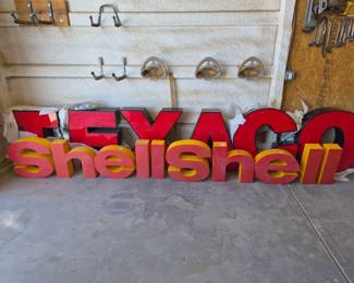 Texaco and Shell signs are lighted and need to be rewired