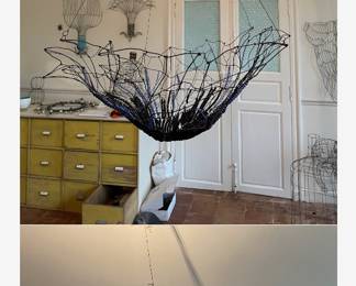 pic of a Marie Christophle chandelier in the Dior Showroom, Paris