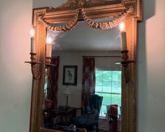Amazing large gold mirror with sconces. 