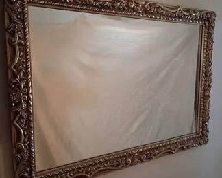 Ornate Gold Colored Framed Mirror