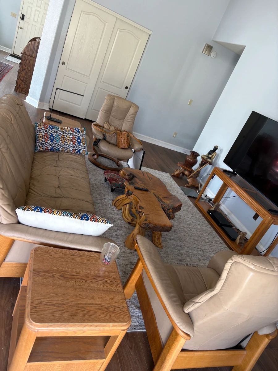 Living room set with two leather chairs and one couch