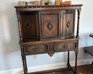Antique carved tall sideboard