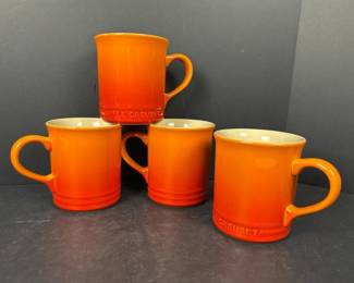 012 fourorangelecreusetstonewaremugsli