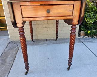 Lot #109 - Antique Sheraton Mahogany Drop Leaf Table with Turned Spiral Barley Twist Legs and Single Drawer on Casters