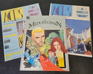Lot #178 - Vintage Acme Press Aces Comic Books and DC Medusa Chain by Ernie Colon