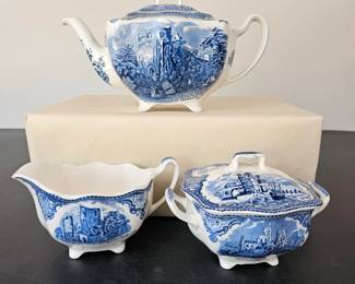 Lot #53 - Vintage Johnson Brothers Old Britain Castles Blue & White Transferware Teapot, Covered Sugar Bowl, and Creamer Set